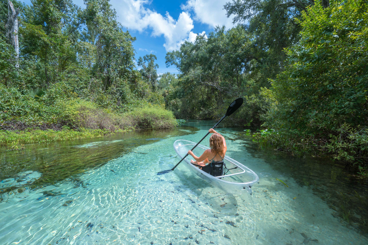 Woman kayaking in a clear river in Orlando